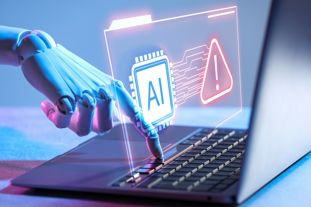 Robotyczna dłoń na klawiaturze laptopa z holograficzną ikoną czerwonego ostrzeżenia i napisem AI, reprezentująca błędy i nieporządek przy wdrażaniu technologii bez jasnych struktur.